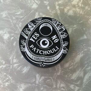 Patchouli scented candle green wax glitters when melted - ouija planchette cover